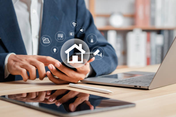 istock Smart home technology concept. Control all the functions of your home through your smartphone. Home automation system. Technology of the future. 1473228391