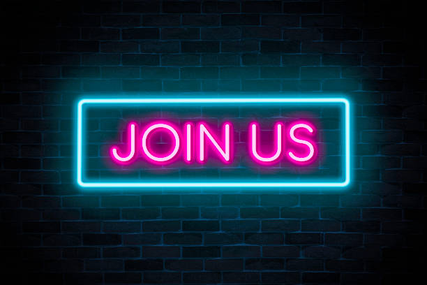 istock JOIN US neon banner on brick wall background. 1473228394
