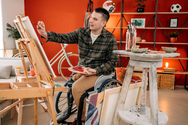 istock An artist in a wheelchair 1473228500