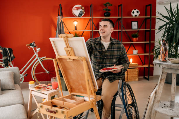 istock An artist in a wheelchair 1473228502