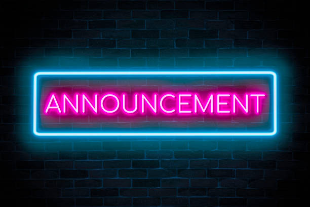 istock Announcement text neon banner on brick wall background. 1473228512
