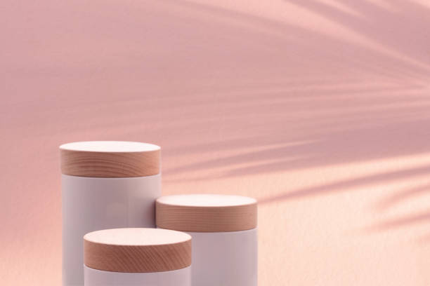 istock Minimal podium tabletop floor with blurred tropical palm leaf shadow pink pastel background.Cosmetic beauty natural product placement promotion stand display.jungle forest summer paradise concept. 1473228805