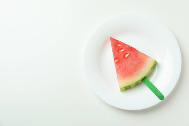 Slice of ripe watermelon isolated over a white background