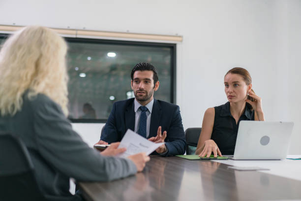istock business meetings work with a group for develop marketing analytics. Business people, documents and meeting in marketing strategy, advertising or corporate statistics at the office. 1473230479