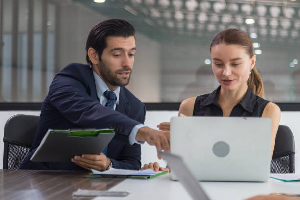 istock business meetings work with a group for develop marketing analytics. Business people, documents and meeting in marketing strategy, advertising or corporate statistics at the office. 1473230511
