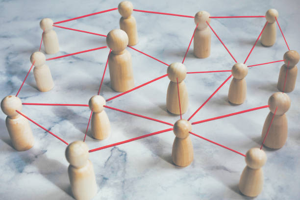 istock Connection building a strong team, team work Business and technology concept. Human resource, HR, recruitment, management, leadership and team building. management concept 1473231525