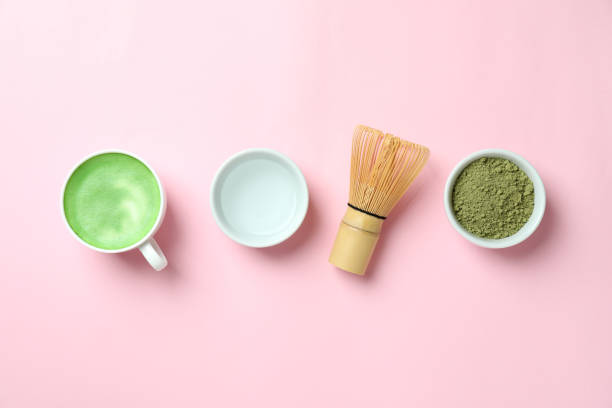 istock Matcha latte and accessories for making on pink background 1473232083