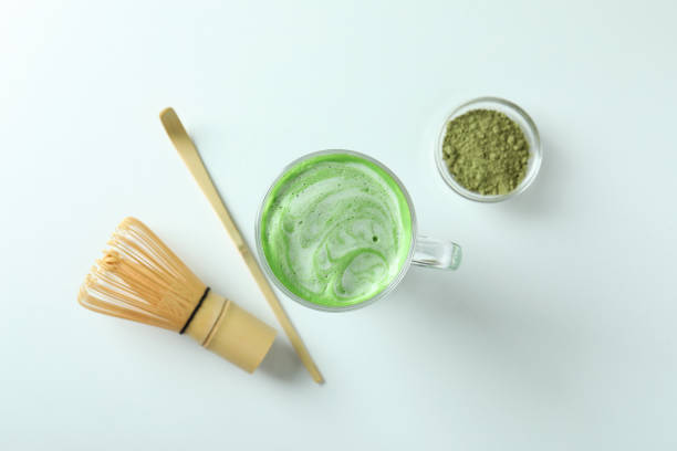 istock Matcha latte and accessories for making on white background 1473233453