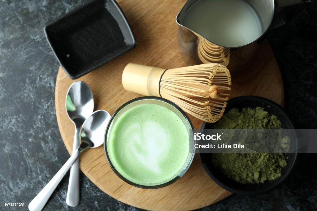 Glass Of Matcha Latte And Accessories For Making On Black Smokey Table  Stock Photo - Download Image Now - iStock