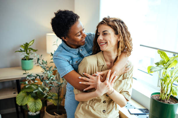 istock Couple embracing at home 1473234365