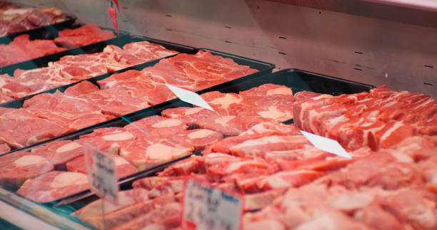 istock Window seen range of fresh meat precuts for grill or barbecue. 1473235103