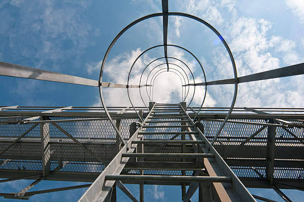 istock Vertical walkway ladder up grain storage silo 147323781