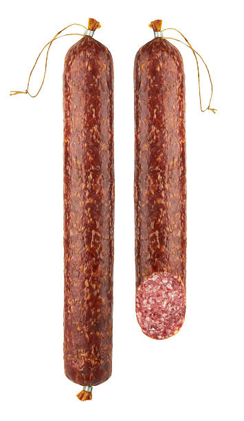 istock Two fresh salami hanging on a white background 147323806