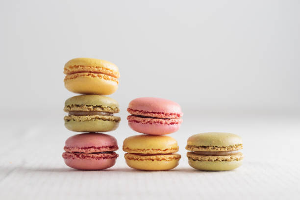 istock Colorful pastel eco handmade natural macaroons on white background. Gift for 8 March, International Women's Day, Valentine Day 1473242623