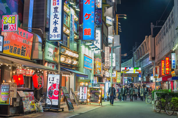 Tokyo Japan, tourist walking at Ameyoko Market near Ueno Station by night stock photo