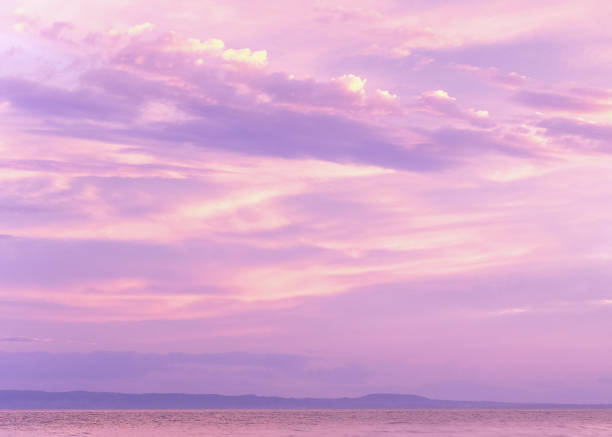 istock Golden and purple sunset under the sea 1473243062