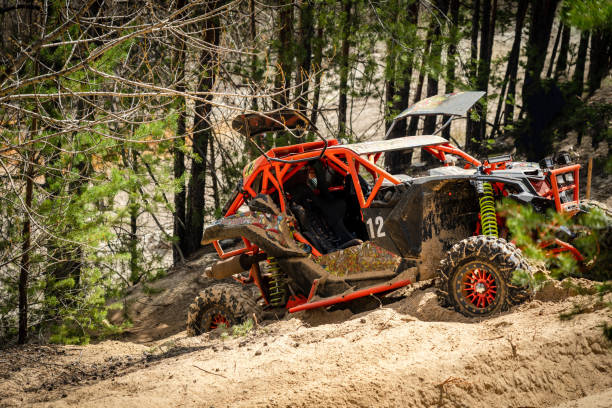 istock UTV, ATV off road driving in sandy open area. Buggy extreme riding 1473243304
