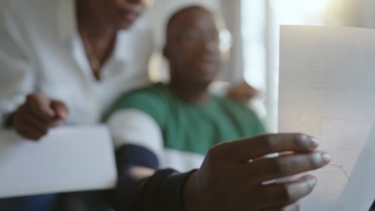 Couple going over bills together at home