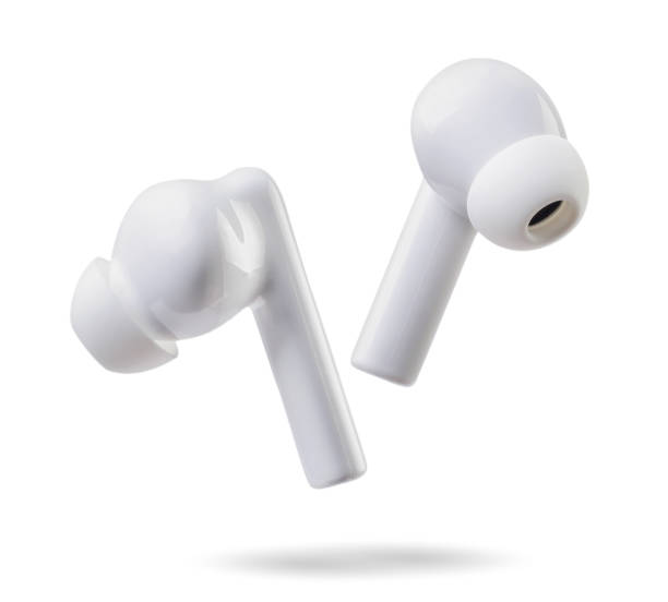 istock Wireless headphones fly on a white background. Isolated 1473251143