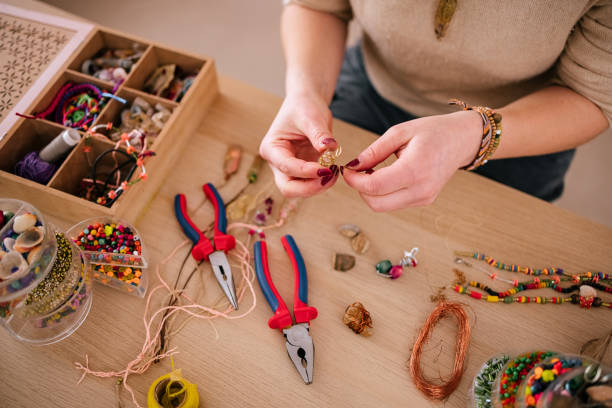 istock Making jewelry in a home workshop 1473253928