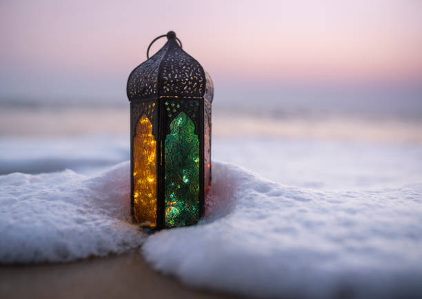 istock Islamic Lantern lamp on the beach 1473254535