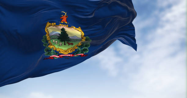 istock The Vermont state flag fluttering in the wind on a clear day 1473255741