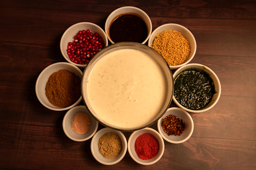 Here are the ingredients for preparing Dahi vada, which is a tangy snack originating from the Indian State of Maharashtra. It is prepared by soaking vadas (fried pulses ball) in thick dahi (Curd) and sprinkled with indian spices.
