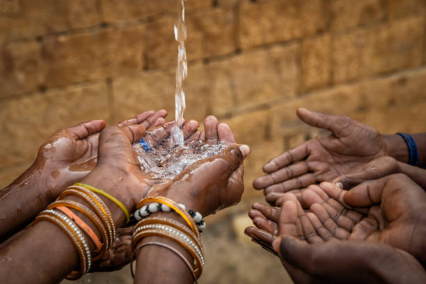 istock Poor Indian children asking for fresh water, India 1473264422