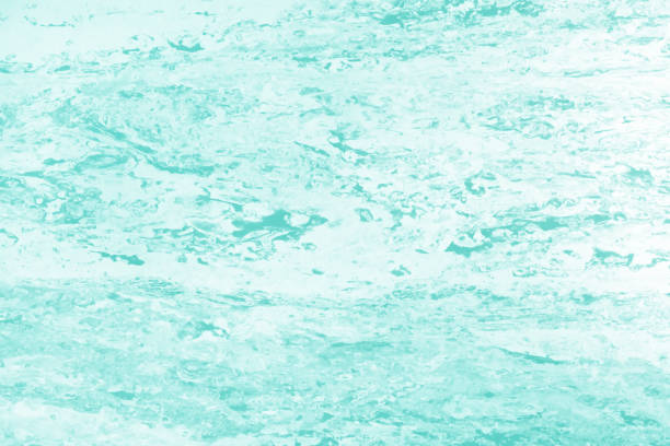 istock Colorful polyethylene foam sheet texture. Rough porous surface teal blue color. Abstract background 1473265359