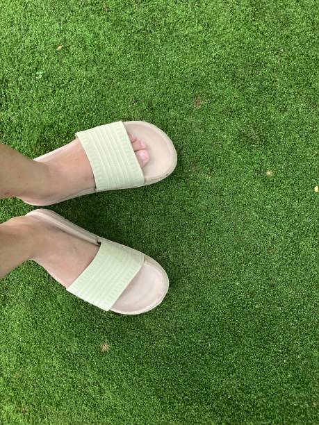 istock feet flat on the mossy ground 1473265619