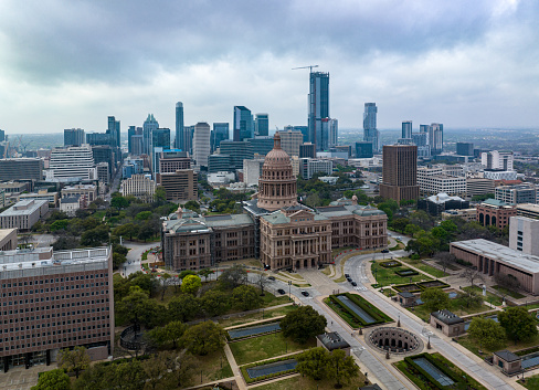 Austin, Texas, USA - September 15, 2023: Perfect Golden Hour Colors over Cityscape Views of Austin Texas Downtown near Town Lake with Traffic and congested Capital city views