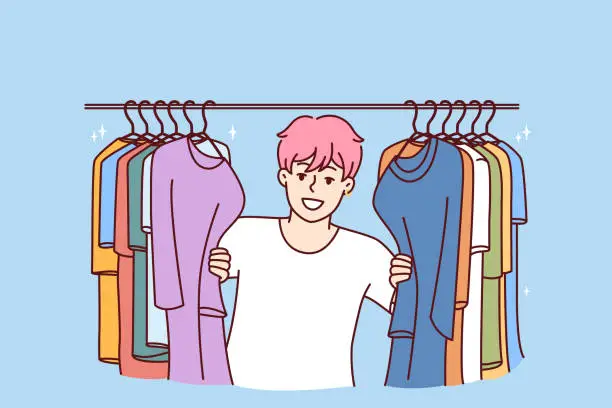 Vector illustration of Young Cheerful man in t-shirt smiling peeking out from behind hanger for collection of clothes