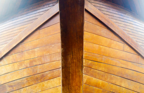 wooden boat body, old type gulet in dry dock on land, old painted, maintenance works