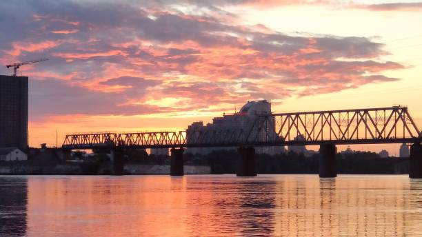 istock Landscape with Railway  Bridge on sunset in Kyiv city 1473297351
