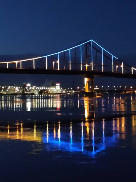 istock PARK BRIDGE pedestrian bridge ILLUMINATED BY NIGHT 1473297474