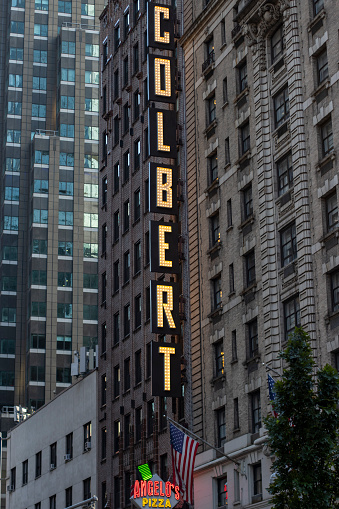New York, NY, USA - July 2, 2022: The Colbert sign is seen outside the Ed Sullivan Theater, the production location of the Late Show with Stephen Colbert, in the Theater District of Midtown Manhattan.