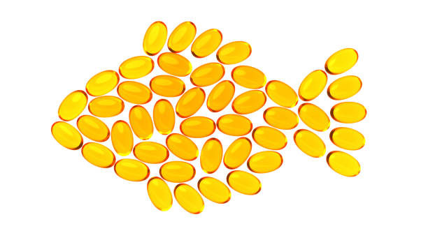 fischförmige omega-kapseln isoliert auf dem weißen hintergrund. fischöl vitamine - fish oil cooking oil capsule herbal medicine stock-fotos und bilder