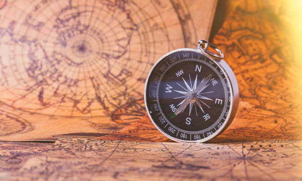 istock Looking for adventure. Compass and maps. Treasure map and path to the treasure. 1473302529