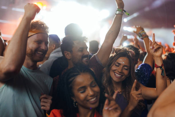 istock Party people dancing at concert 1473307024