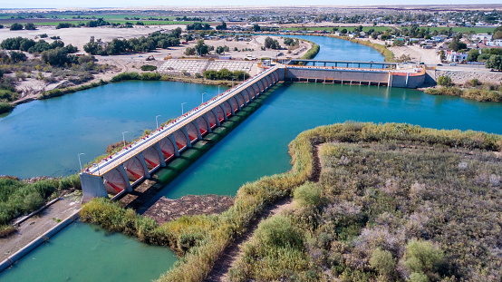 Aerial Drone View of the Colorado Diversion Dam River Drainage at International Barrier Between Yuma Arizona and Algodones Near the International Border Wall, Baja California Norte Mexico on a Sunny Day