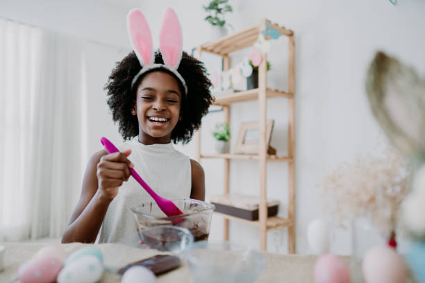 istock Child girl preparing chocolate for easter 1473312147