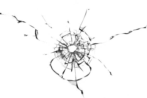 istock Broken hole in glass white background 1473314386