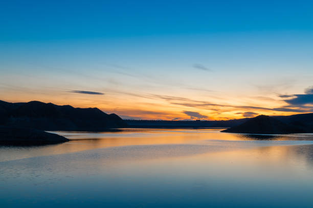 istock Beautiful  mountains and lake landscape after sunset. Panoramic sunset landscape. 1473315672