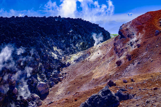 In active volcano crater (volcanic vent) - lava with fragmentary scoriae (cinder block lava), fumarole, solfataras, volcanic emanations (sour, hydrogen sulfide gas), sulfur deposits, etc. Kamchatka