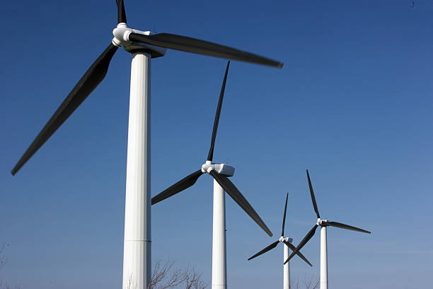 Power generating windmills stock photo