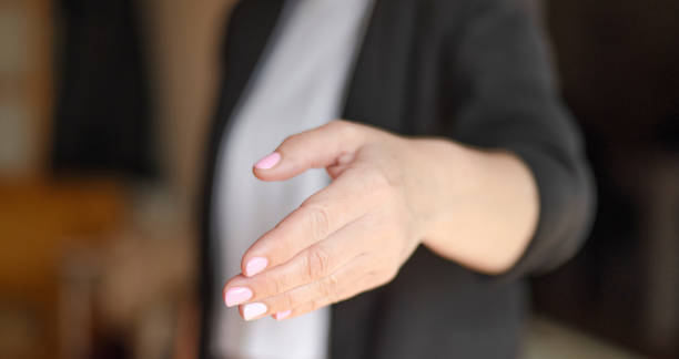 istock Professional Woman With A Handshake. 1473327754