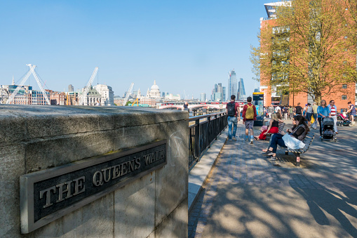 The Queen's Walk, a promenade located on the southern bank of the River Thames in London, England. It is part of the Thames Path.