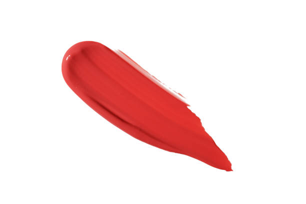 istock Lipstick smear smudge swatch isolated on white background. Cream makeup texture. Bright red color cosmetic product brush stroke swipe sample 1473329176