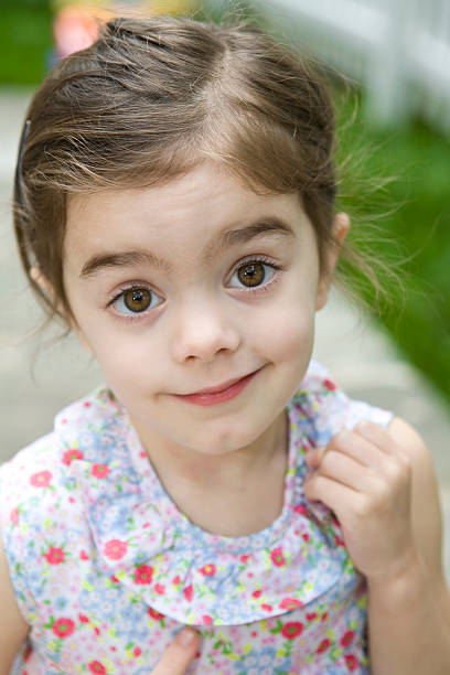 Little Girl Looking Surprised stock photo