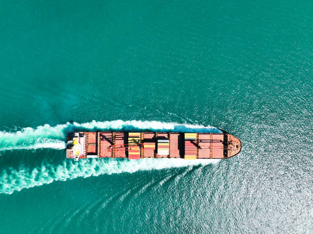 istock Aerial view of cargo ship in transit. 1473330555
